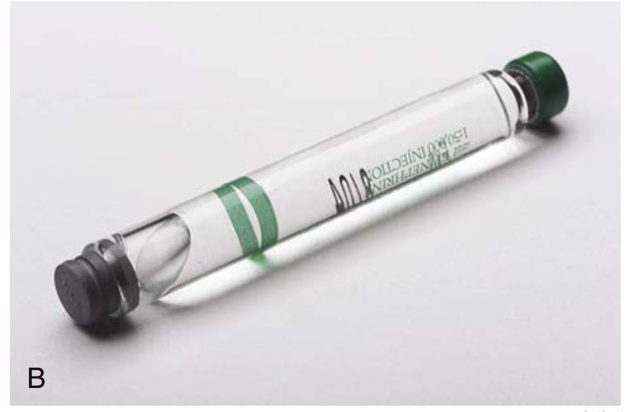 Hình 7.9. (B) Ống thuốc tê với bọt quá to và nút chặn bị đẩy lùi ra sau do bị đông lạnh.